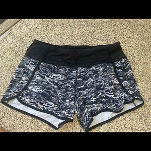 Lululemmon, speed up high rise shorts. Size 6, 4 inches long. Multi-colored.